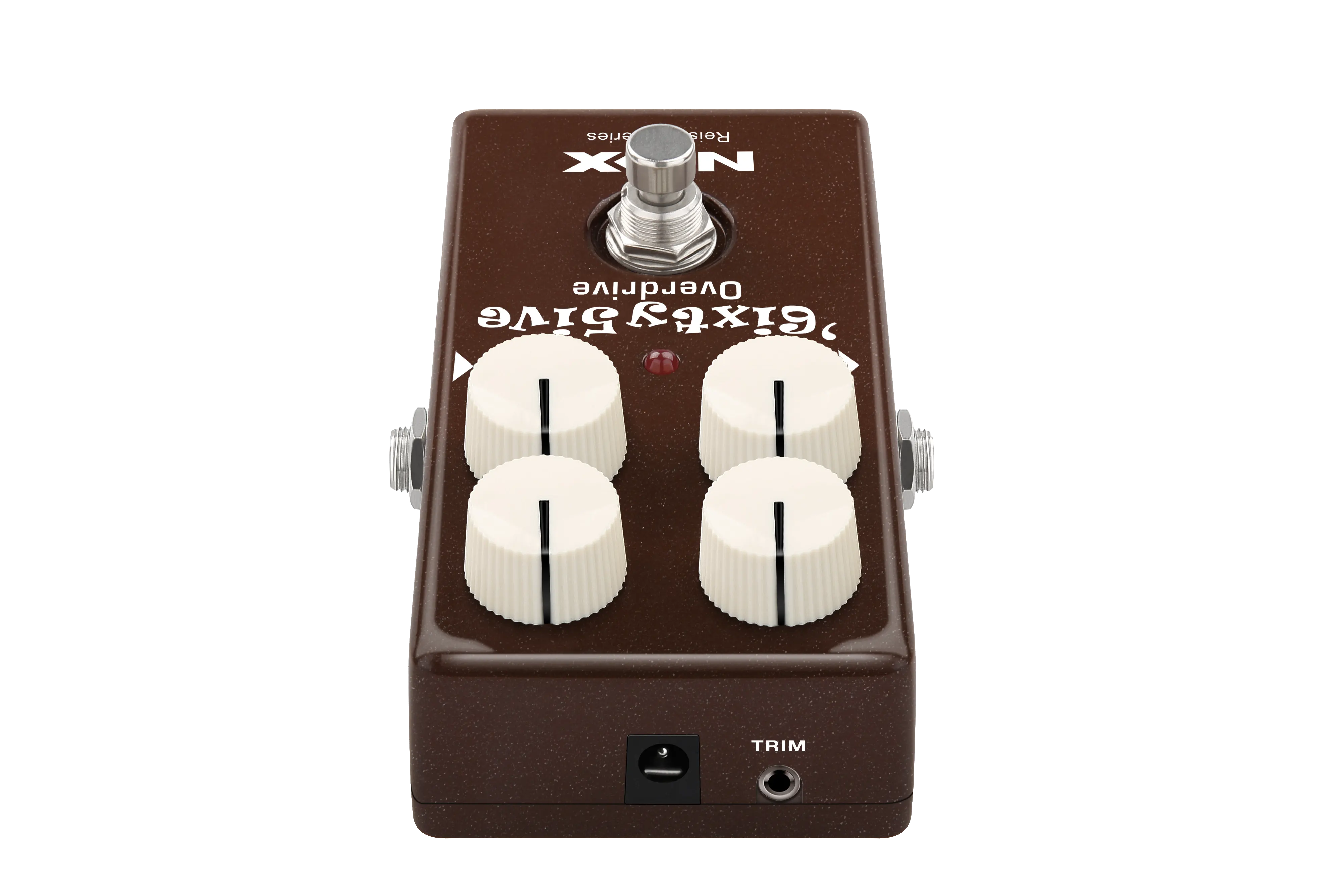 Brown FX pedal with four large white knobs, a footswitch, one red LED indicator, and labeled input, output, power, and trim jacks.