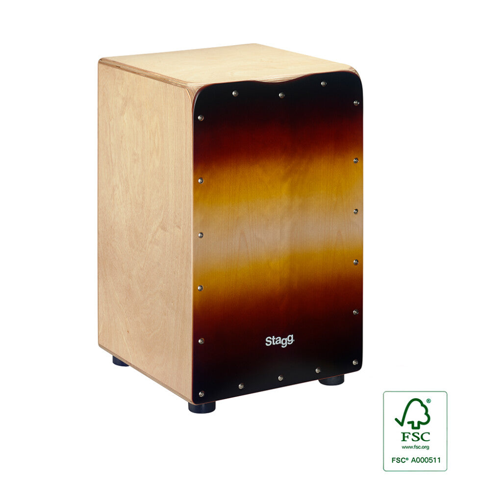 Wooden cajon with natural sides, sunburst front panel, rubber feet, and visible screws along the front edge; "Stagg" logo on the front.