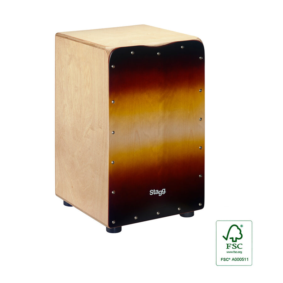 Wooden cajon with natural sides, sunburst front panel, rubber feet, and visible screws along the front edge; "Stagg" logo on the front.