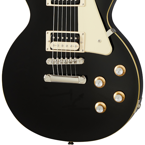 Black electric guitar body with cream pickguard, two humbucker pickups, chrome bridge, and four gold-rimmed control knobs.
