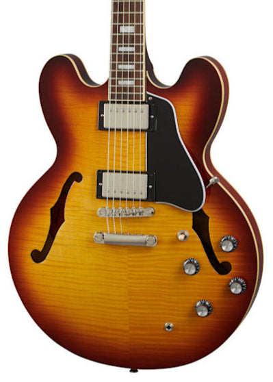 Sunburst Epiphone semi-hollow electric guitar with dual humbucker pickups, four control knobs, and two f-shaped sound holes.