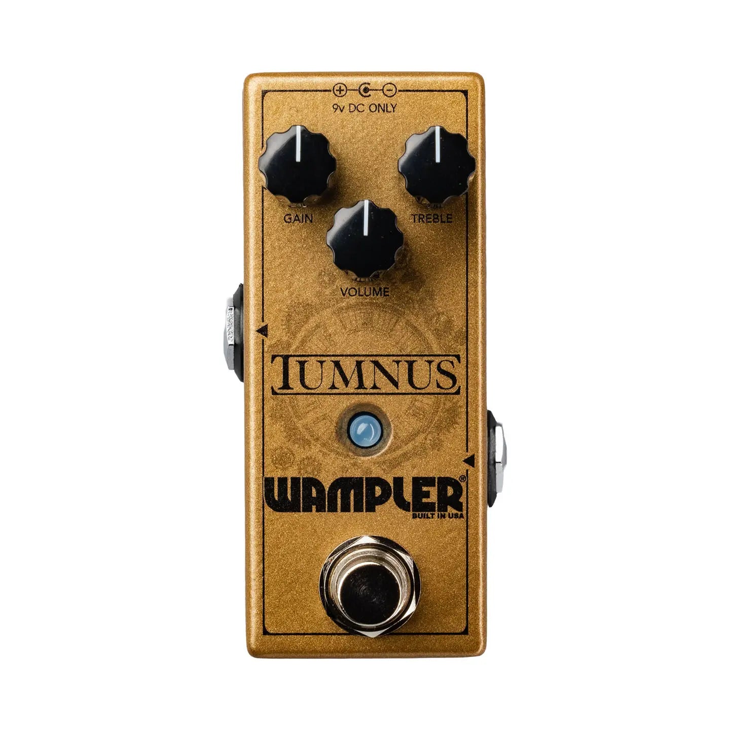 Gold Wampler Tumnus guitar effects pedal with three black knobs labeled Gain, Treble, and Volume, one footswitch, and a blue LED.