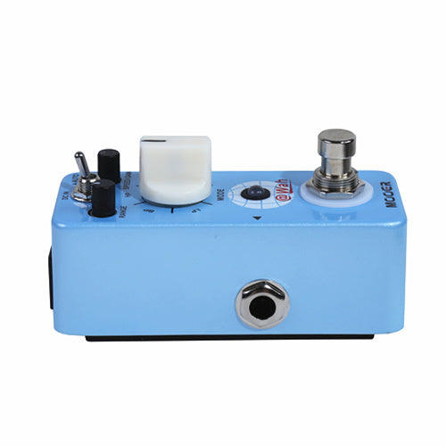 Compact blue effects pedal with a large white knob, a footswitch, two small black knobs, and a side jack input.