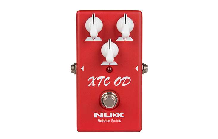 Red NUX XTC OD guitar FX pedal with three white knobs labeled V, T, G, a footswitch, and white text on the face.