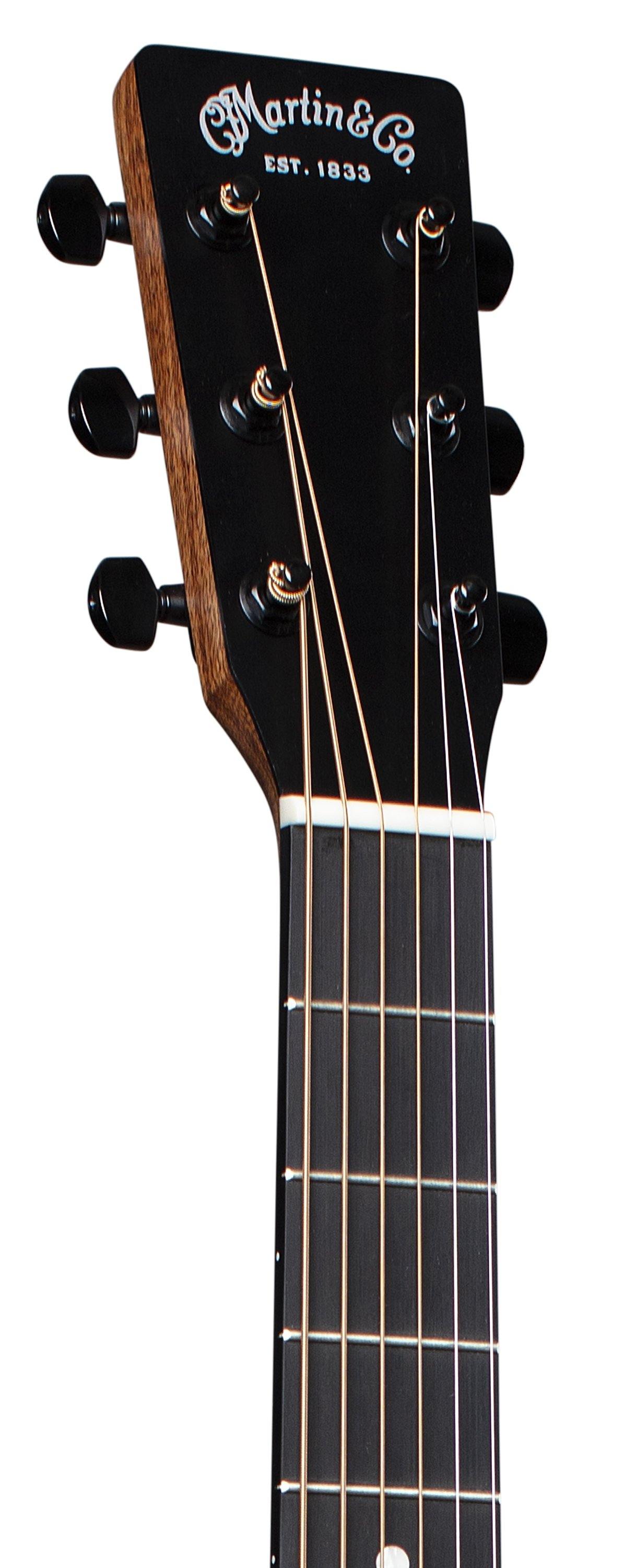 Martin & Co. acoustic guitar headstock with six tuning pegs, black finish, and "Est. 1833" in silver lettering above the fretboard.