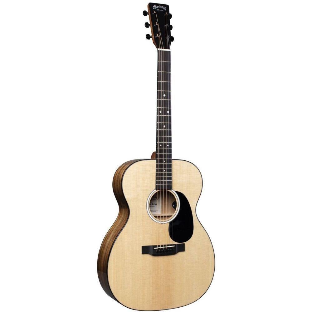 Acoustic guitar with a light-colored top, dark sides, black pickguard, and six tuning pegs on a dark headstock with white logo.