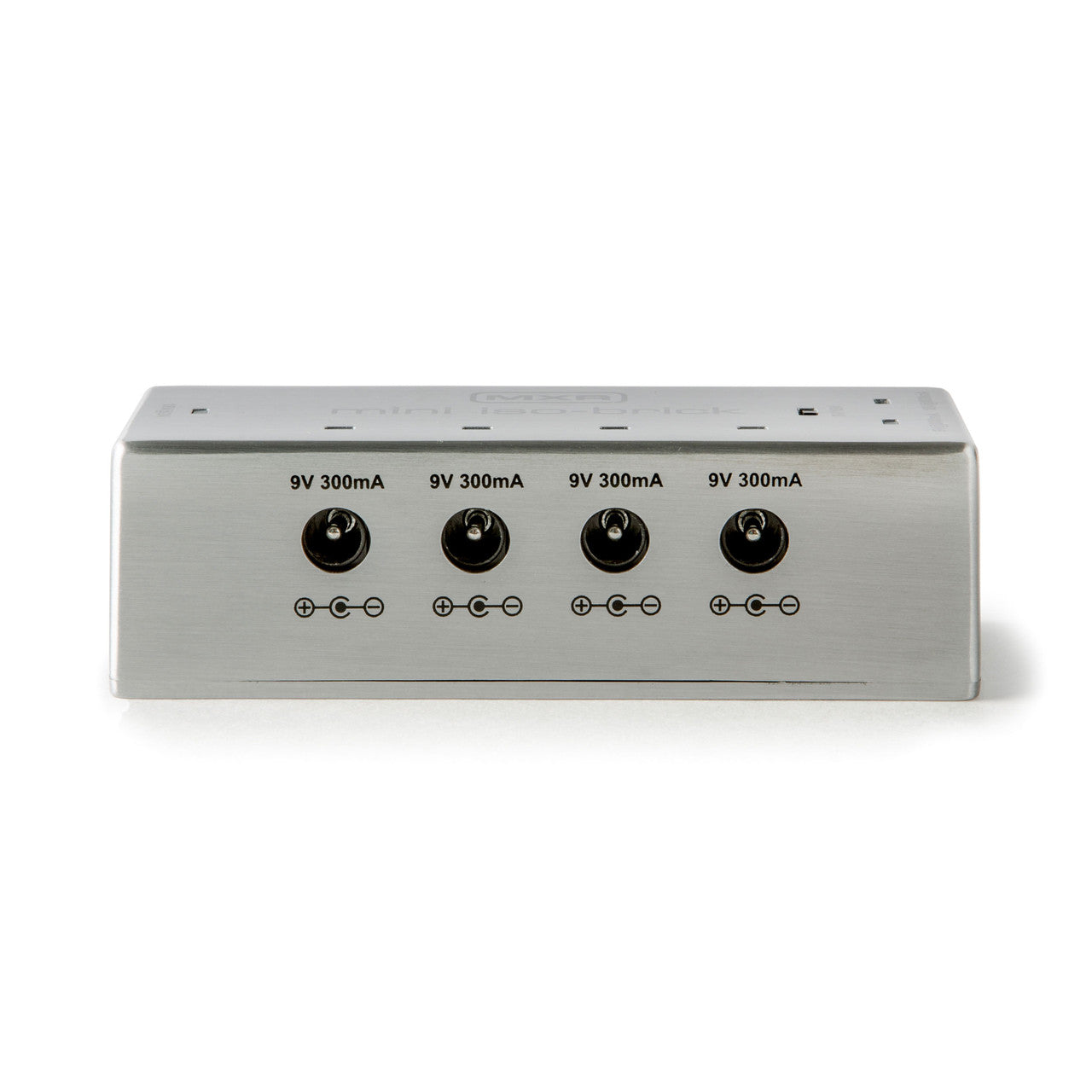 Silver FX pedals power supply with four 9V 300mA output jacks in a row, each labeled with polarity symbols below.