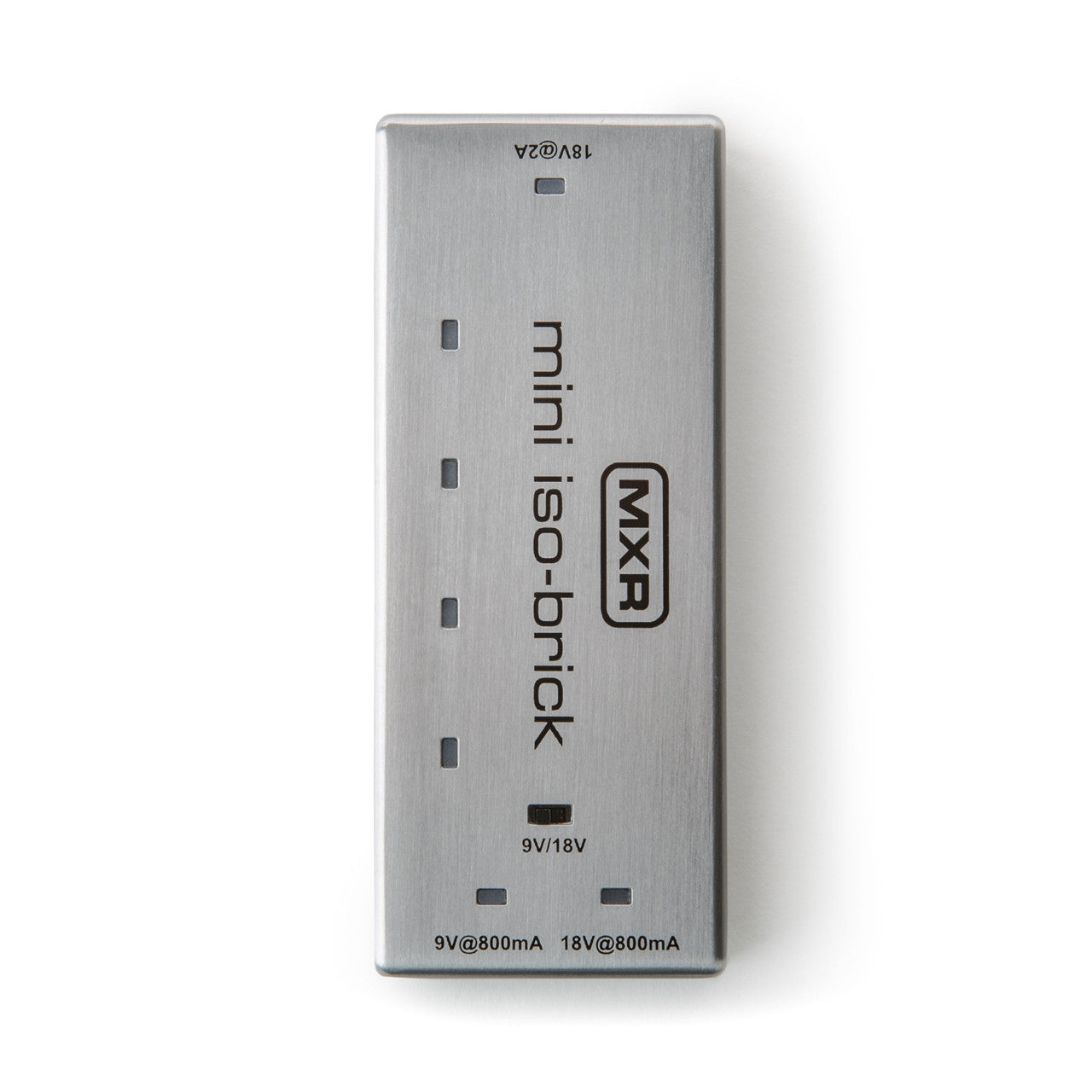 Slim silver MXR mini iso-brick FX pedal power supply with five output ports labeled for 9V and 18V, compact rectangular metal case.
