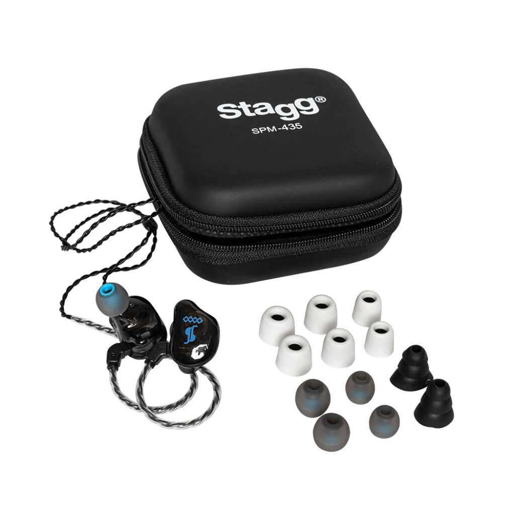 Black zippered carrying case labeled "Stagg," black in-ear monitors, and multiple sets of differently sized ear tips are shown.