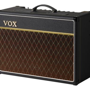 Black VOX amplifier with a brown diamond-patterned speaker grille, gold trim, and a carrying handle on top.