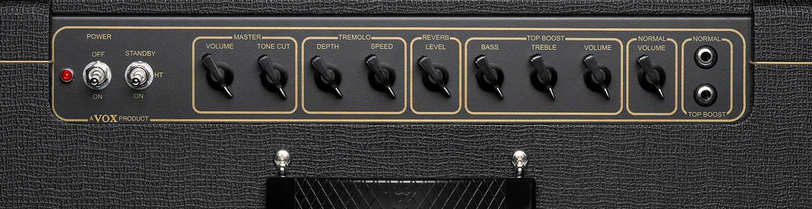 VOX amplifier control panel with toggle switches for power, seven black knobs for sound settings, and two input jacks labeled normal and top boost.