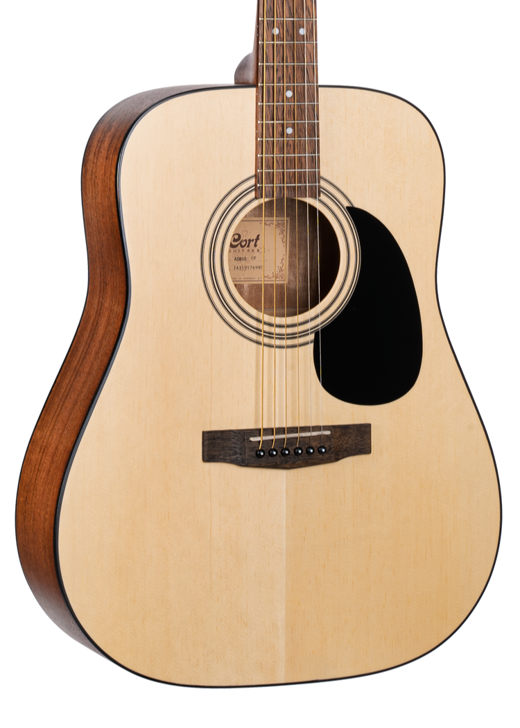 Light wood acoustic guitar with a dark wood bridge, black pickguard, and six strings. The sides are a darker brown wood.