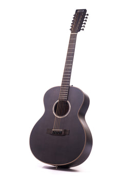 Black 12-string acoustic guitar with a glossy finish, rounded body, light trim, circular sound hole, and tuning pegs on both sides of the headstock.