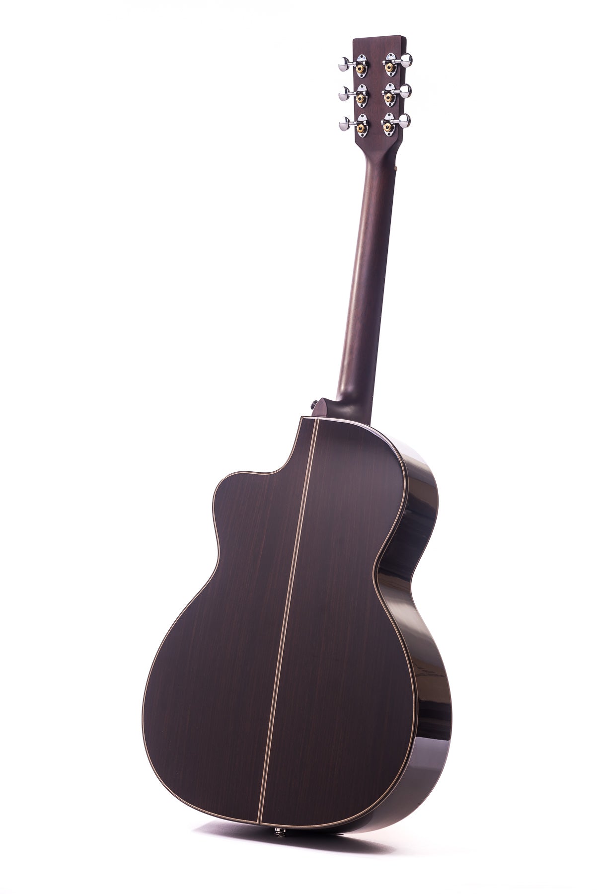 Dark wood acoustic guitar shown from the back, with a single narrow light stripe down the center and a cutaway body for easier access to higher frets.