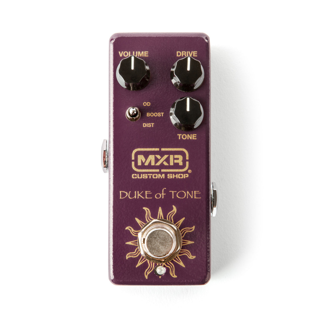 Purple MXR Duke of Tone effects pedal with three knobs labeled Volume, Drive, Tone, a small toggle switch, and a footswitch with a sun design.