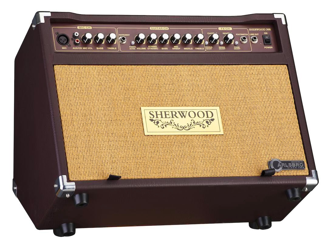 Brown and tan Sherwood amplifier with multiple control knobs, labeled input jacks, and a large woven fabric speaker panel on the front.