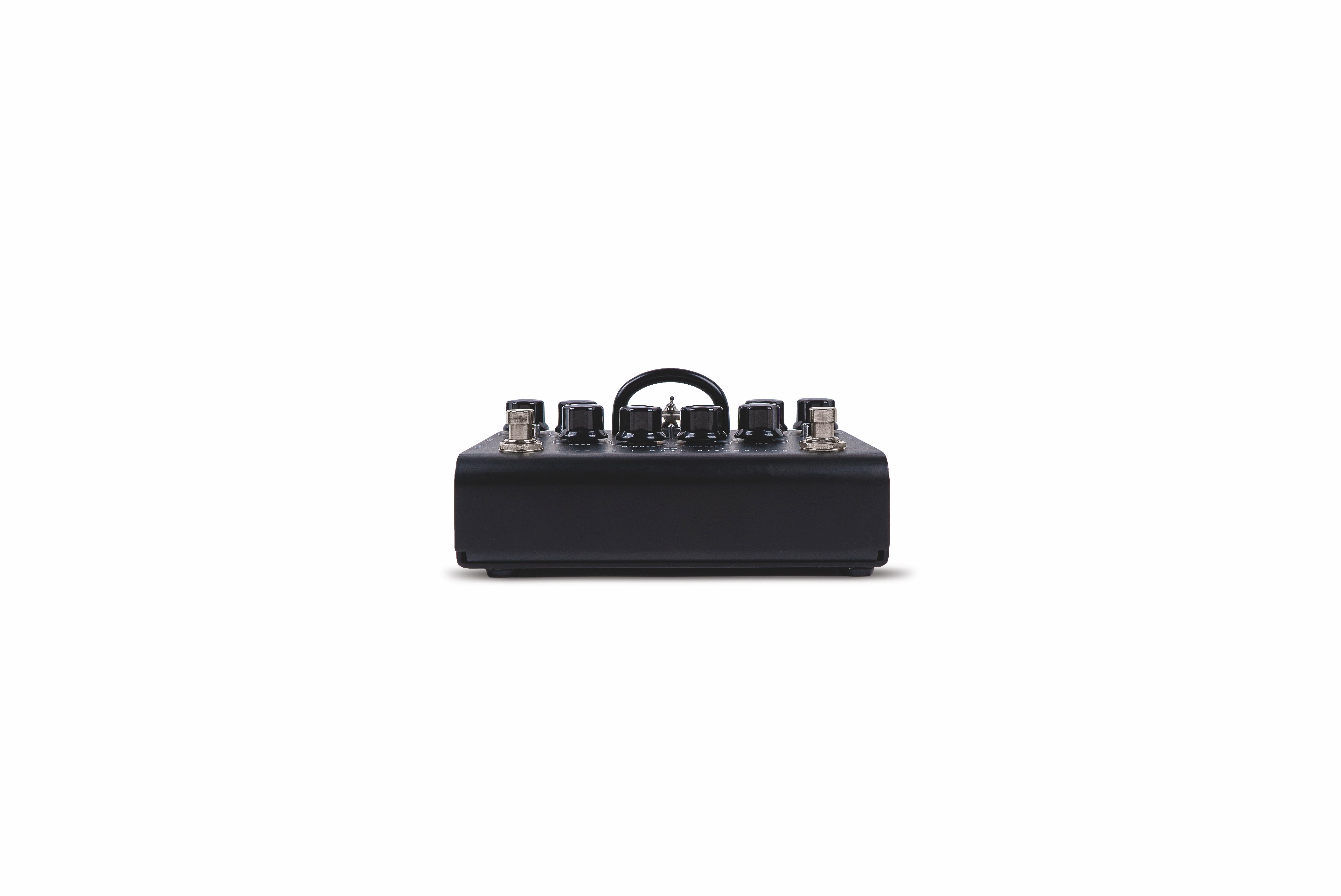 Black FX pedal with five knobs, two footswitches, and a handle on top, viewed from the front against a white background.