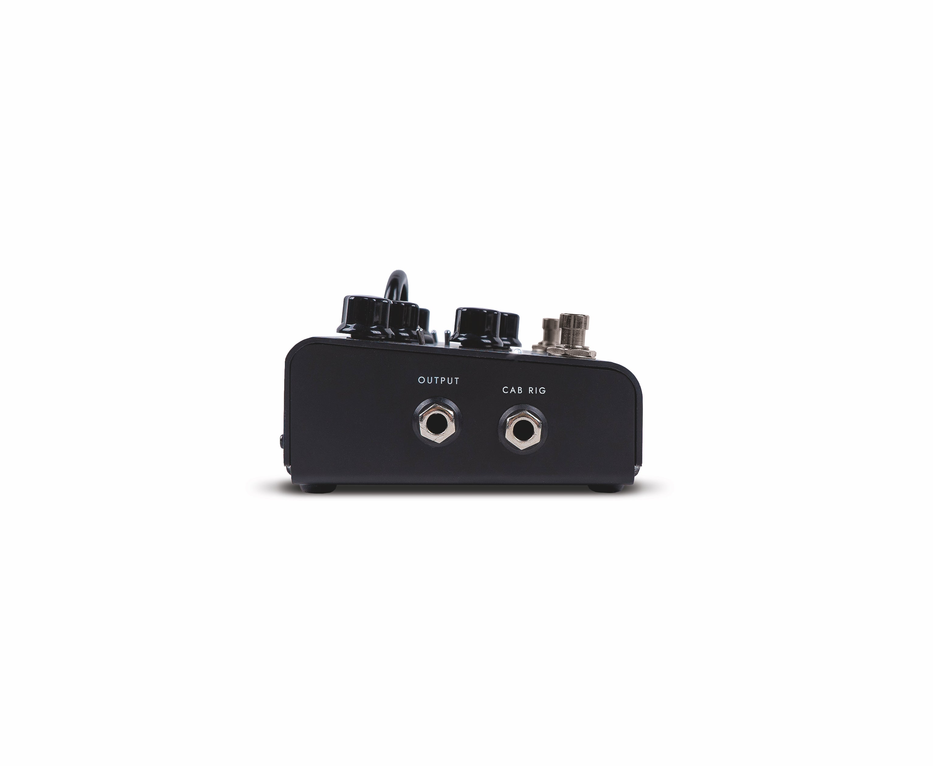 Black FX pedal with two labeled jacks on the front panel, marked OUTPUT and CAB RIG, plus visible top-mounted control knobs.