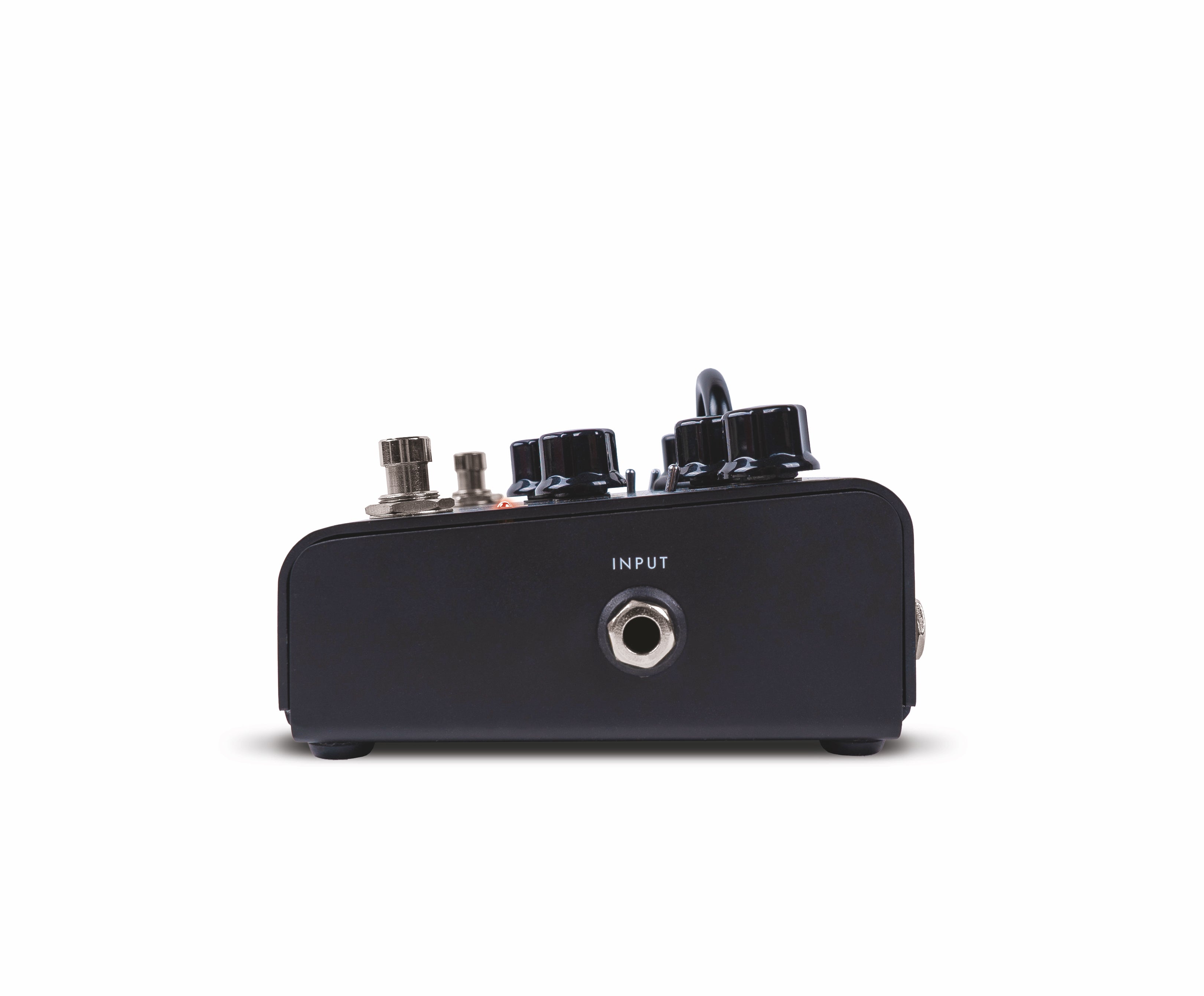 Black FX pedal viewed from the side, showing an input jack, three control knobs, and two metal footswitches on the top panel.