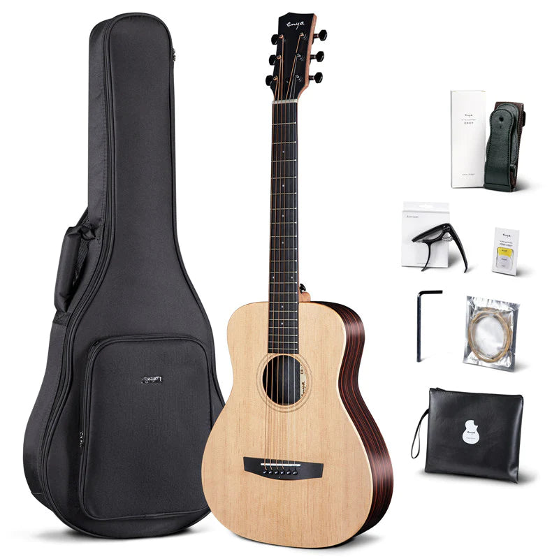 Izuzi acoustic guitar with a black padded gig bag, shoulder strap, capo, tuner, strings, hex wrench, and accessory pouch arranged around it.