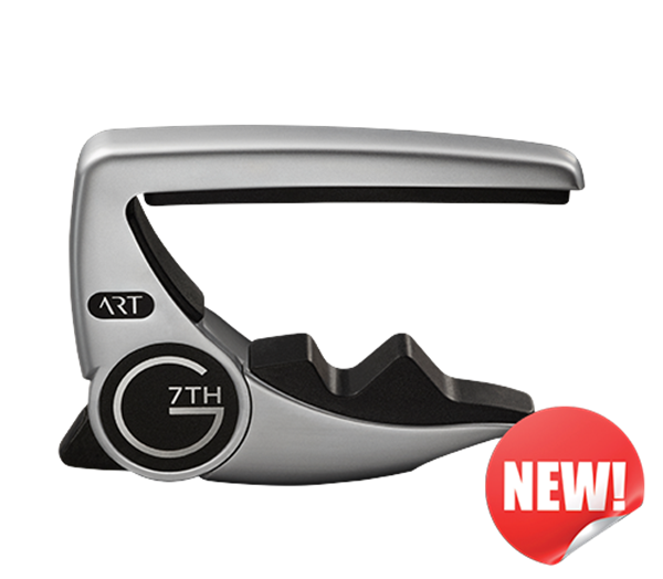 Sleek silver guitar capo with black grip, labeled "G7th ART," and a red "NEW!" sticker in the corner.