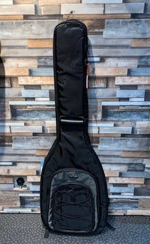 Black padded gig bag with a front zipper pocket and handle, designed for carrying and protecting a guitar.