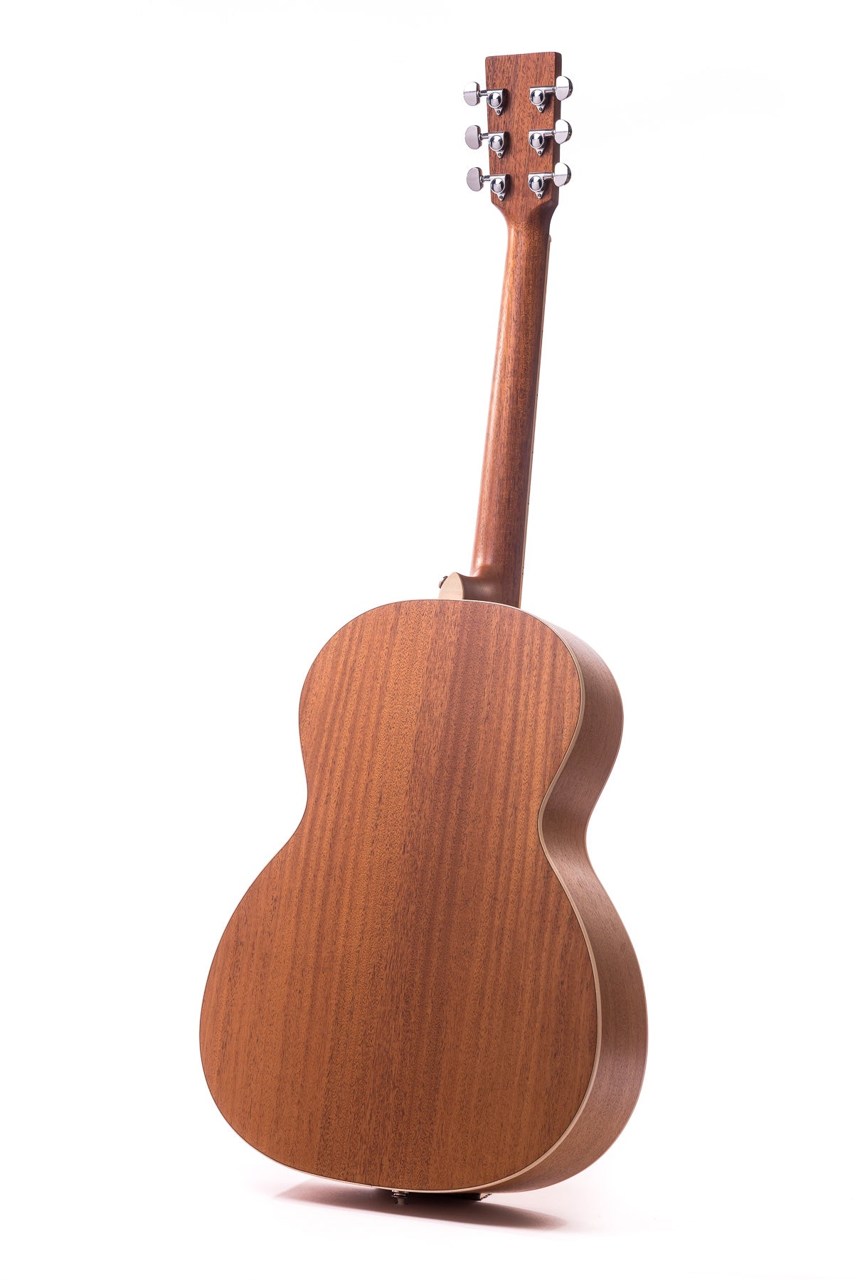 Back view of an acoustic guitar showing wood grain, curved body, and six metal tuning pegs on the headstock.
