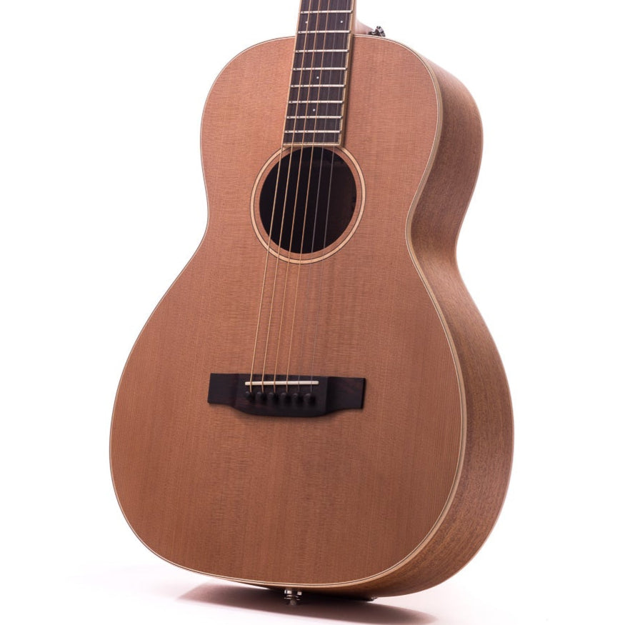 Light brown acoustic guitar with a natural wood finish, six strings, round sound hole, and a simple, unadorned design.