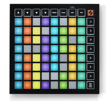 Pro audio controller with an 8x8 grid of multicolored square pads, surrounded by black buttons labeled for navigation and music mode selection.