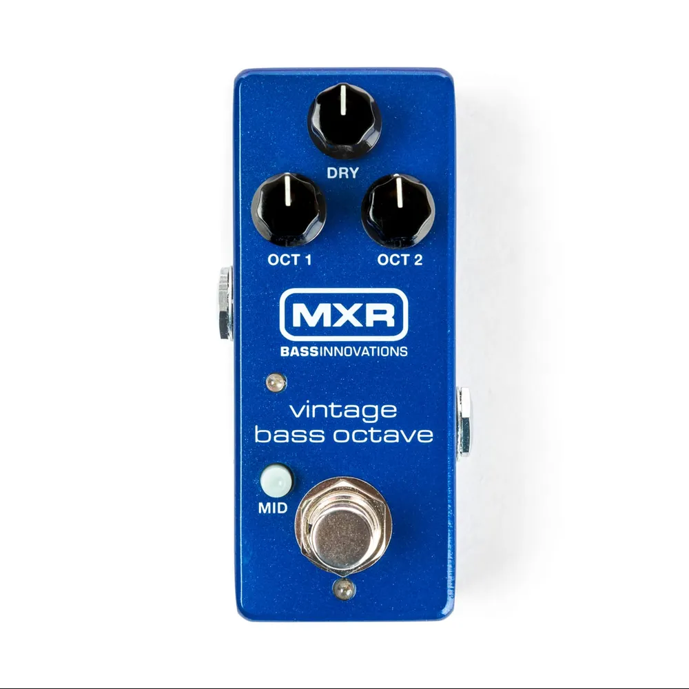 Blue MXR vintage bass octave effects pedal with three knobs labeled Dry, Oct 1, Oct 2, a MID button, and a large silver footswitch.