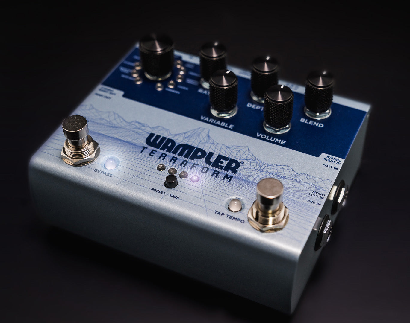 Wampler Terraform FX pedal with six black control knobs, two footswitches labeled bypass and tap tempo, and three small preset buttons.