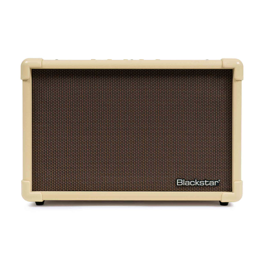 Compact Blackstar amplifier with cream-colored casing and a brown mesh front panel, featuring the Blackstar logo in the lower right corner.