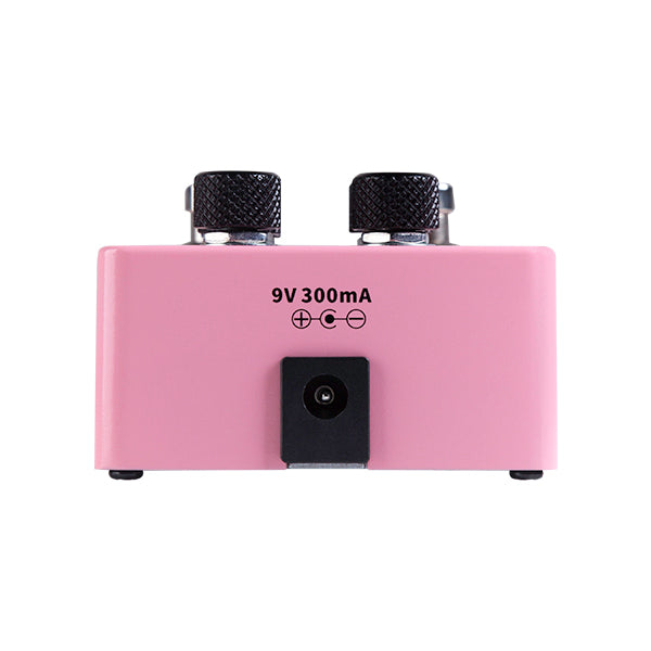 Pink effects pedal showing a 9V 300mA power input port on the back, with two black control knobs visible on top.