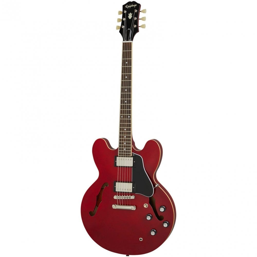 Red semi-hollow electric guitar with two humbucker pickups, four control knobs, black pickguard, and f-shaped sound holes.