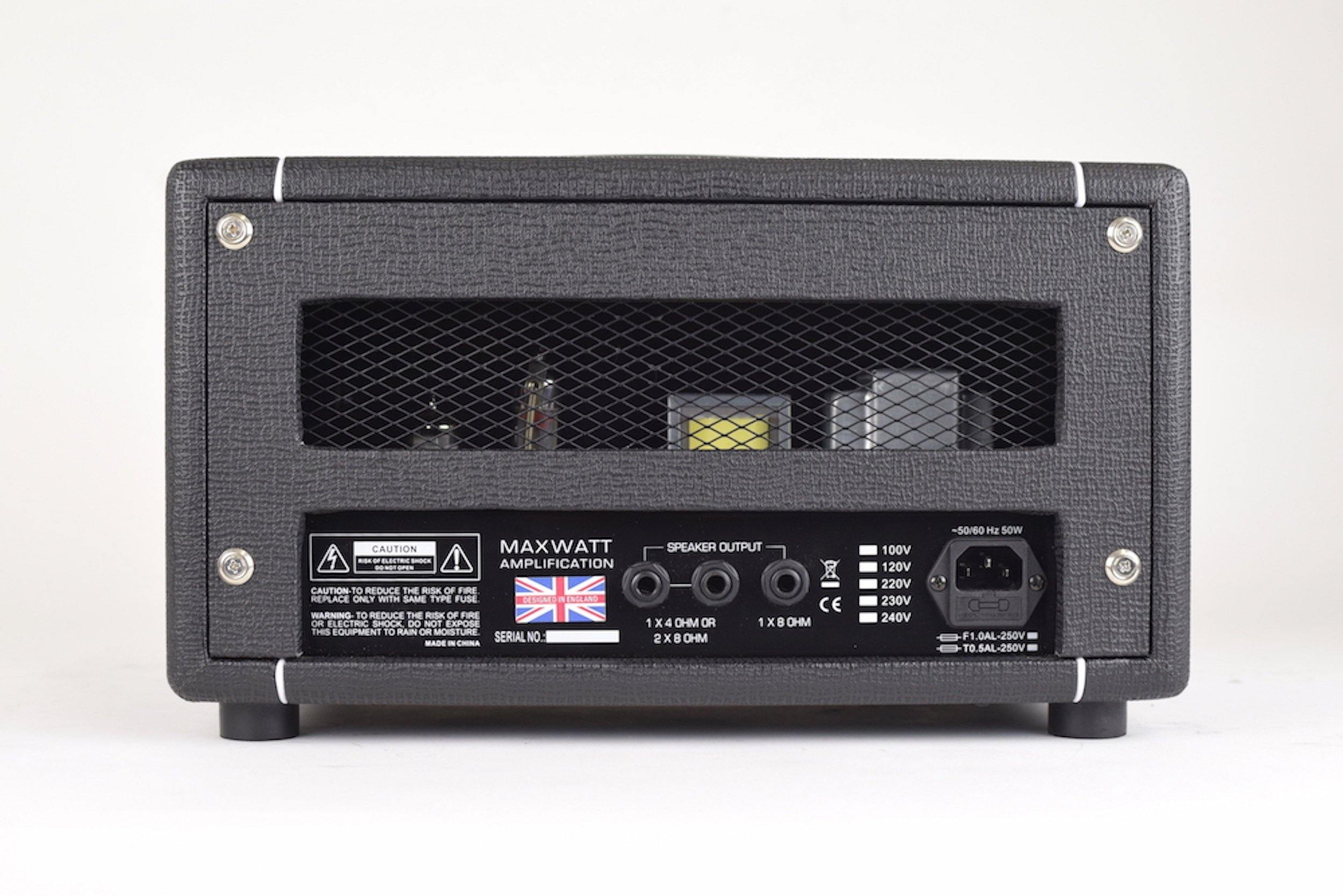 Rear panel of a Maxwatt amplifier showing speaker output jacks, voltage selector, power input, and warning labels in a black textured housing.