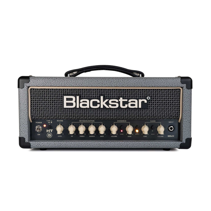 Blackstar amplifier head with a grey casing, black mesh front, large logo, and nine cream-colored control knobs and buttons for various audio settings.