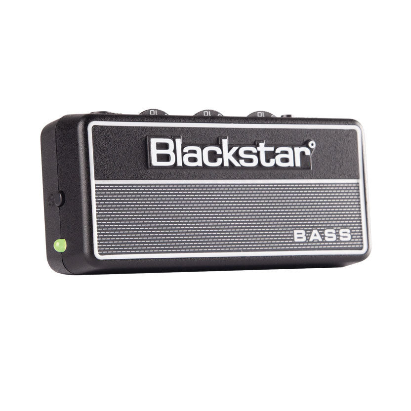 Compact Blackstar bass amplifier with textured black casing, large white brand logo, three top knobs, and a small green power indicator on the side.