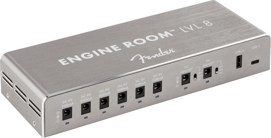 Rectangular metal FX pedal power supply with eight DC outputs, two adjustable voltage ports, and USB-A and USB-C charging ports on the front panel.