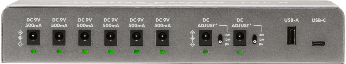 Eight DC power outputs for FX pedals, two adjustable voltage outputs, one USB-A port, and one USB-C port on a metallic panel.
