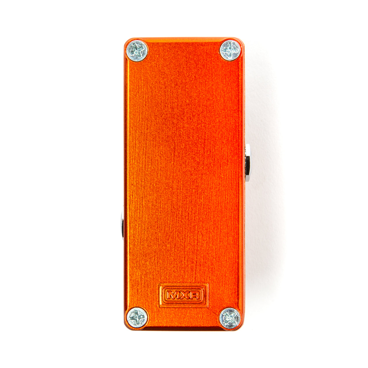 Rectangular orange MXR FX pedal, viewed from above, with visible screws at each corner and no knobs or labels on the top surface.
