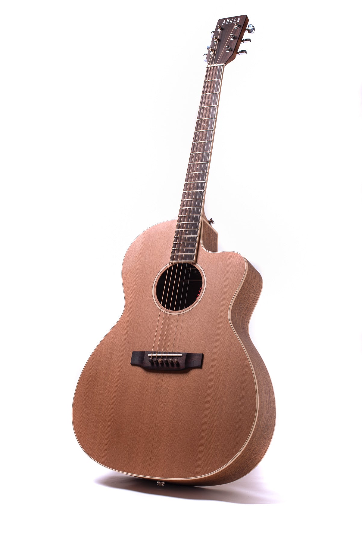 Wood-finished acoustic guitar with six strings, a rounded body, cutaway design on the upper right, and metal tuning pegs on the headstock.