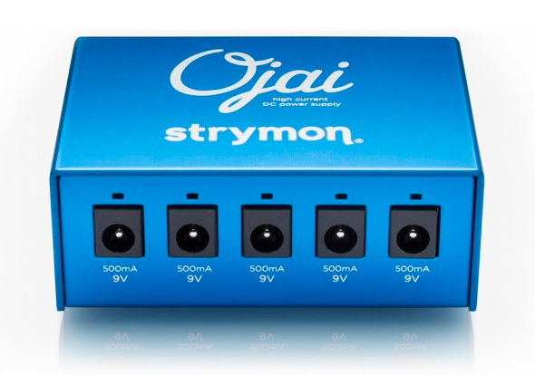 Blue Strymon Ojai pedal power supply with five 9V 500mA outputs arranged in a row on the front panel.