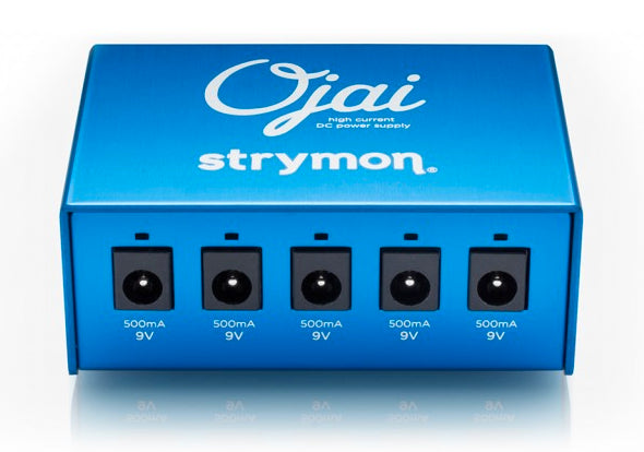 Blue Strymon Ojai pedal power supply with five 9V 500mA outputs arranged in a row on the front panel.