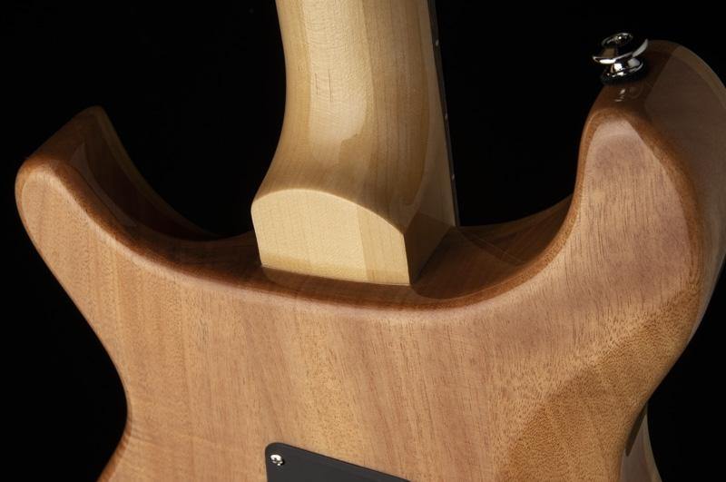 Natural wood finish electric guitar showing the smooth neck joint and contoured body with a visible neck plate screw.