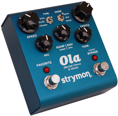 Blue Strymon Ola effects pedal with five black knobs, two toggle switches, two footswitches, and two red indicator lights.