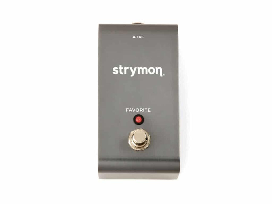 Strymon footswitch with a single metal button, one red indicator light labeled "FAVORITE," and TRS input marking at the top.