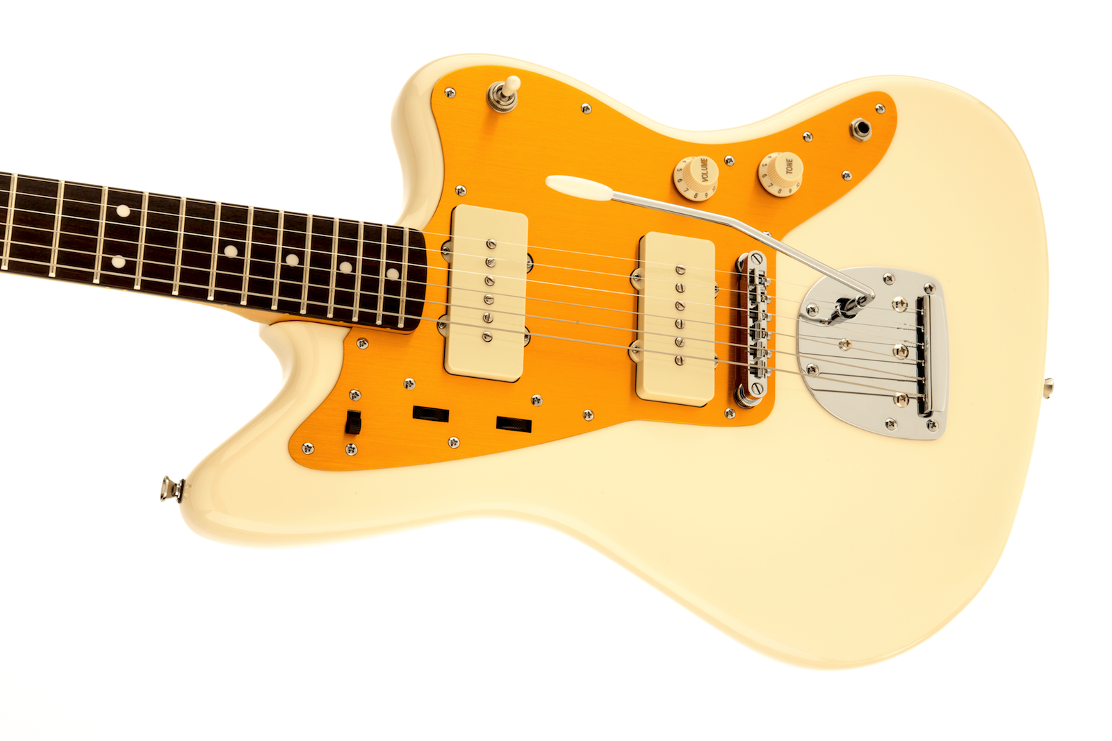 Guitare électrique crème à plaque orange, deux micros larges crème, boutons et interrupteurs, vibrato chromé à droite.