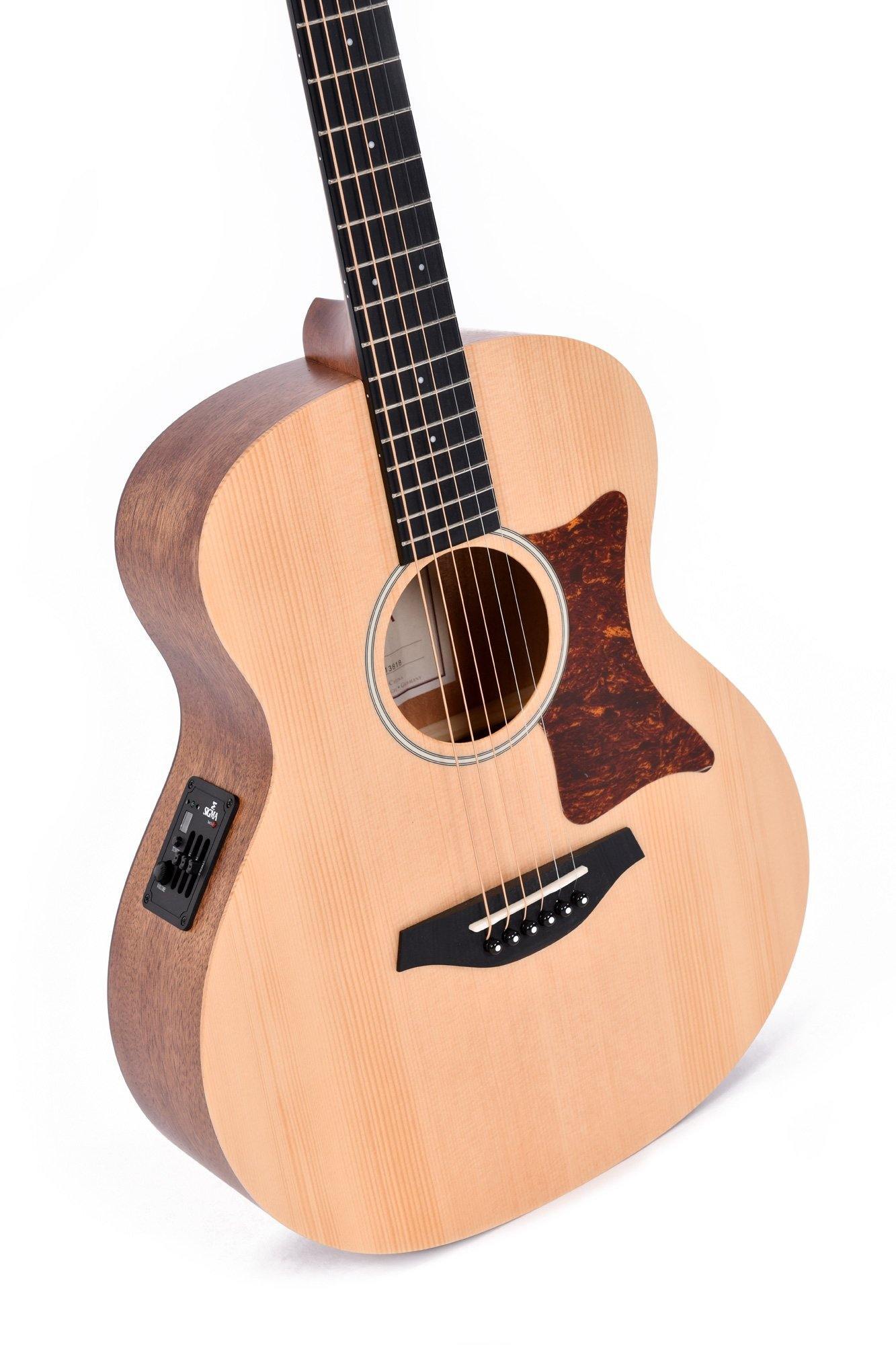 Light wood acoustic guitar with a dark brown pickguard, black bridge, control panel on the side, and six strings.