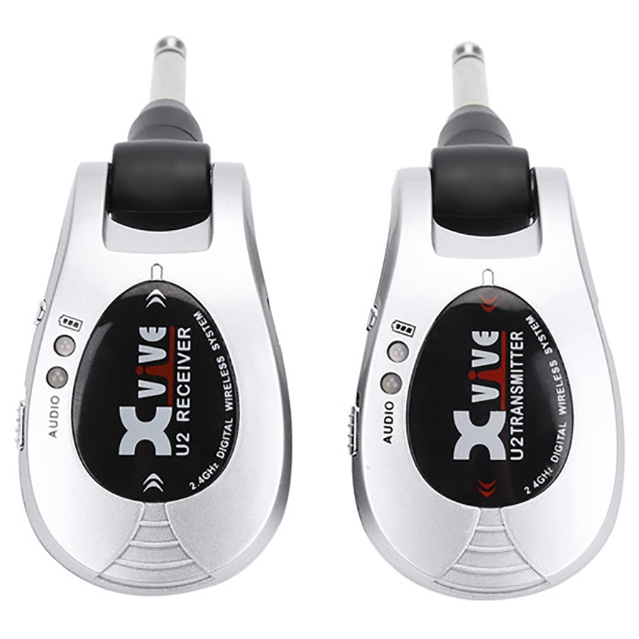 Two silver wireless transmitters labeled U2 Receiver and U2 Transmitter with black and red accents and attached 1/4-inch audio plugs.